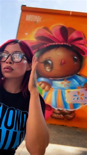 Mr B Baby 🇵🇷 🇲🇽 Michelle Ruby on Instagram: "Just a girl creating her own world 🌎 thank you @beyondwallslynn for having me and for everyone who was a part of this mural. Including my baby girl who assisted me 🥹💙 thank you for bringing me on board @golden305 @kobrapaint"