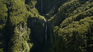clip-3430166345-scenic-drone-footage-cascading-waterfall-mountains-madeira