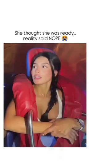 TrueReel on Instagram: "The post features a 37-second vertical video of a woman on a nighttime roller coaster, where intense G-forces cause her loose white tank top to repeatedly slip down, exposing her breasts as she screams in panic and disbelief. - With over 5.7 million views and 39,000 likes in two days, the clip's viral success stems from its unfiltered humor and relatability, echoing common amusement park mishaps amplified by social media's thirst for authentic fails. - MiaReels1, an accou
