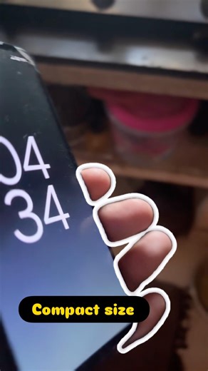 PIXEL 4A DROPPED INTO FRAME FROM TOP, LANDS ON DARK SURFACE WITH SATISFYING THUD.