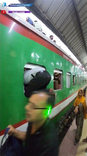 Helpless passengers struggle to board the overcrowded train amid heavy rush