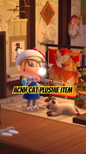 Just admiring my new cat plushie that I bought from the hotel 😻😻😻 #acnh #animalcrossing