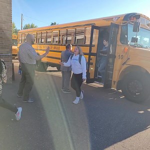 25K views · 380 reactions | New Bruce School District Administrator Tony Bosco and new Middle/High School Principal Travis Augustine greet students getting off the bus. Students there returned to class this week. Most other schools in the area start Tuesday, September 2. Drive safe everyone with the buses and kiddos out and about! | Ladysmith News | Facebook