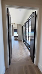 What’s down this hallway? It takes us through a beautiful loop. Build: @superior_customhomes Seen in @pcshowcaseofhomes 🎥 @buildingutah ✨follow @buildingutah for more home and design inspiration in your feed #luxuryhomedesign #homedesignideas #inspiration #quietluxury #demure #bespoke #luxeathome | Building Utah