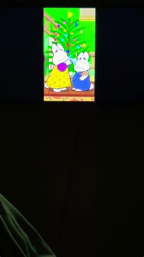 Max and ruby is putting decorations on Christmas tree short video