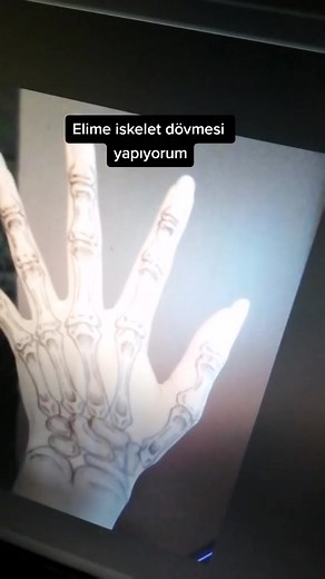 Skeleton Hand Tattoo Inspiration and Ideas