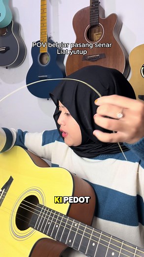 Tutorial Mengganti Senar Gitar yang Putus