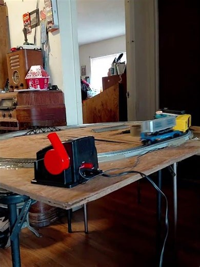 First train on our new O scale train layout with plywood and table. TEW engine. 01/11/26