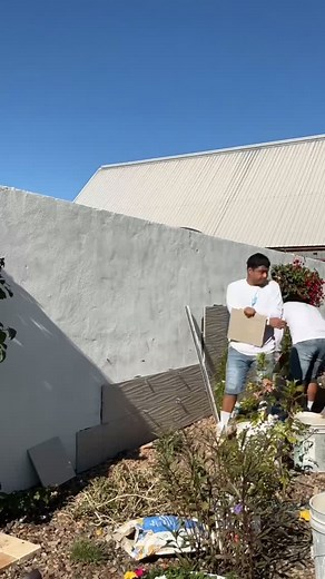 1.2K views · 13 reactions | Craftsmanship in motion. Porcelain tile, laser lines & a crew that knows how to make materials perform. HQ backdrop coming together, Barefoot style禮 #barefootpoolsaz #azpools #azbackyard | Barefoot Pools | Facebook