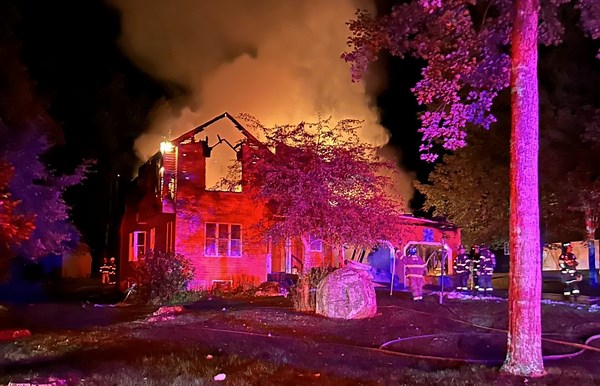 Woman rescued from total loss house fire in Bennington