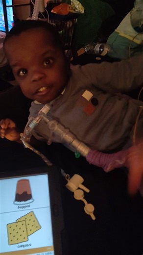 Ivy Farquharson🇯🇲 on Instagram: "Irie was given an iPad with a few aac program options so we can trial them. He has already started having too much fun 😂"