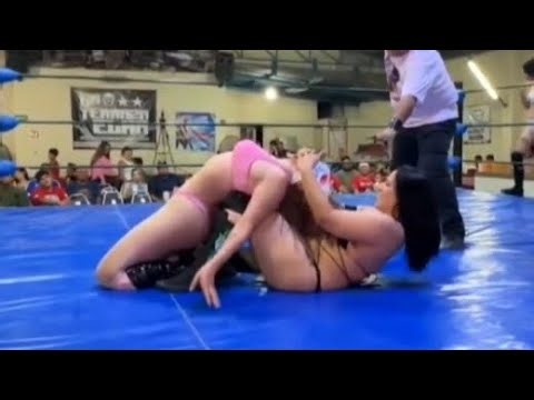 Women wrestling dragon sleeper hold