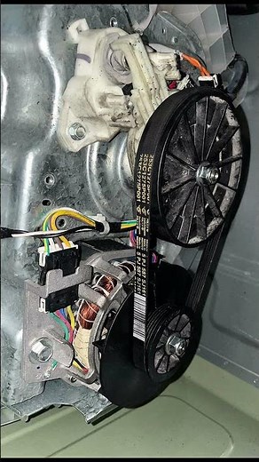 GE top load washer. Drive belt replacement