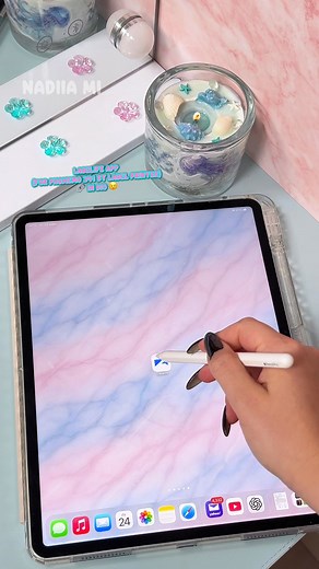 1M views · 21K reactions | Liquid Magic in a glass ✨ This Water Candle DIY feels like holding a tiny ocean — calm, bright, and cozy. I printed the label with my Phomemo 241BT thermal printer, and it turned out perfect 冀 If you love relaxing DIYs, this one will steal your heart.  ASMR sounds, shimmer layers, and soft blue waves — everything you need to feel the calm.  Link for the printer is in my bio! #CandleLover #Phomemo #cozyvibes Phomemo | Nadiia Mi | Facebook