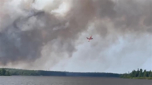NEW FIRE NEAR PADDY’S POND (NL) —The fire as viewed from the eastern side of Paddy’s Pond about a half hour ago. Credit: Tony English | Meteorologist Eddie Sheerr
