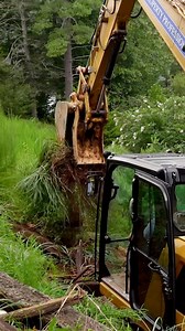 Moving along on this lakeside retaining wall project 🪨 Catch all the action from this day in the comments… #dirtwork #retainingwalls #heavyequipmentoperator | John Seaman