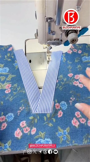 a sewing technique for applying a V-neck collar using bias binding #sewing #sewinghacks #zipping