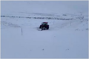 Cars stuck in dirty snow after drifts as weather causes travel chaos for Scots