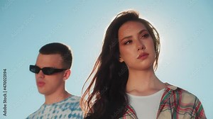 Joyful Multicultural Teenagers Standing In Circle, Young people, man and woman, medical protection safety coronavirus covid 19 masks, Low Angle. Generation z millennials have fun on party in circle