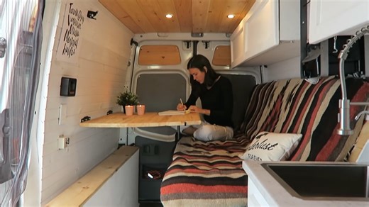 They cancelled their apartment lease and built a van home instead