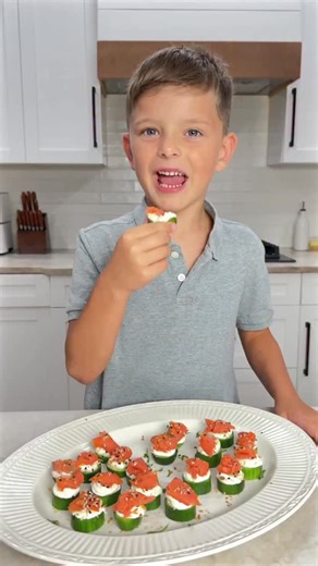 Valentina's Corner on Instagram: "If you’re looking for the perfect light and crunchy party appetizer, then these cucumber salmon bites are for you! 🥒Comment “bites” for the full recipe details; trust me, this appetizer is going to be a sure hit! Crisp cucumber slices are topped with a cream cheese layer, salty salmon, and our favorite seasoning!"