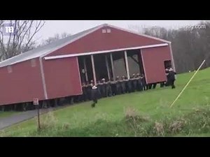 300 amish men moving a barn 💪