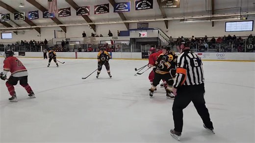 Manchester Firefighters playing Boston Bruin Alumni at the JFK. | Manchester Information