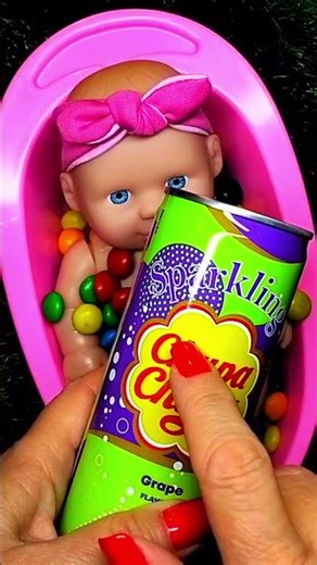 OMG! 12 seconds of satisfying video with a rainbow bathtub completely filled with M&M's candies!