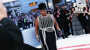 Lizzo drips in pearls and chanel at the Met Gala