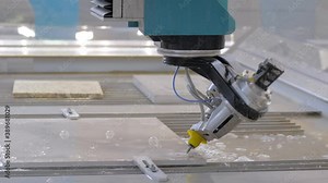 Metalworking, industrial, manufacturing, technology concept. Fast extreme cnc automatic waterjet cutting machine working with sheet metal by high-pressure water jet and abrasive substance