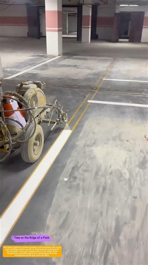 Lines in Concrete: How a Walk-Behind Sprayer Paints Order into a Parking Garage