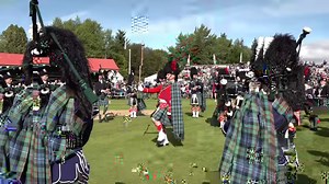 Drum Major Ian Esson and Pipe Major James Cooper lead Ballater & District Pipe Band into the Games field during the 2019 Braemar Gathering in Aberdeenshire Scotland. Each of the bands taking part played in the games field and outside the new Braemar Gathering and Highland Games Centre to give visitors a chance to see them. Visit Braemar . VisitAberdeenshire . | Scotland Online