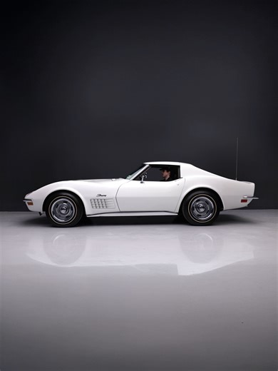 One of the Most Desirable ’72 Corvettes This 1972 Chevrolet Corvette is one of a claimed 240 examples equipped with a 350ci LT-1 V8 as well as factory air conditioning and is finished in white over a Saddle leather interior. Additional equipment includes a Muncie four-speed manual transmission, 15″ Rally wheels, four-wheel disc brakes, a Delco AM/FM radio, and body-color removable roof panels. The car was refurbished during previous ownership and achieved an NCRS Top Flight award in 1991. Previo