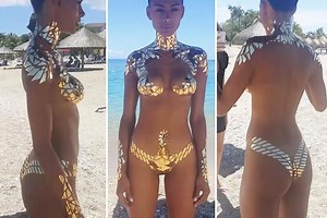 People can’t decide if this woman’s mesmerising bikini is real or body paint