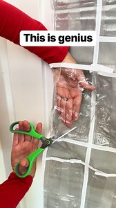 Use a shoe hanger to organize holiday wrapping supplies #wrapping #presents #Christmas #shoes #organization | Liz & Jeff