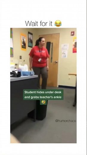 Student hides under desk