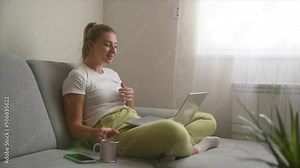 Young woman talking on video call with her psychotherapist doctor after online therapy sessions, happy that she is well and mentally health now after telemedicine conversations.