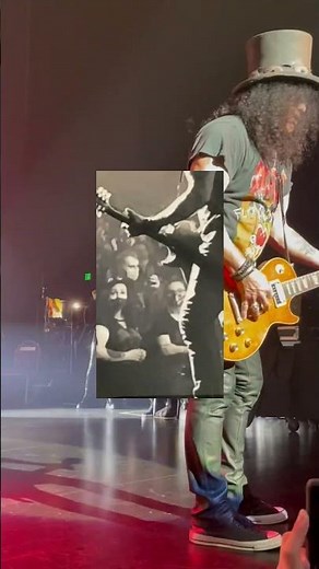 That time Slash’s girlfriend took a picture of Me and Slash from the stage as he was playing.