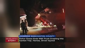 Driver loses control of car during chase, crashes into 2 houses causing significant damage
