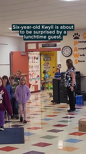 Young Boy's Emotional Surprise with School Lunch Buddy