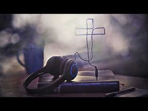 Christian Music Playing From Holy Bible Headphones Making Christian Cross 4K Christian Worship Loop