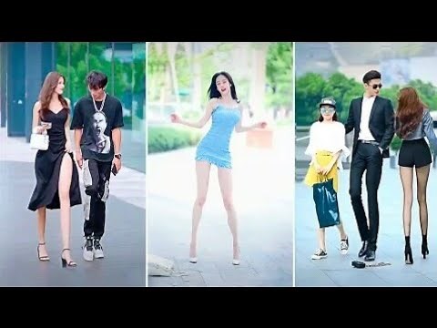Beautiful girl❤ with long legs on the street walking style