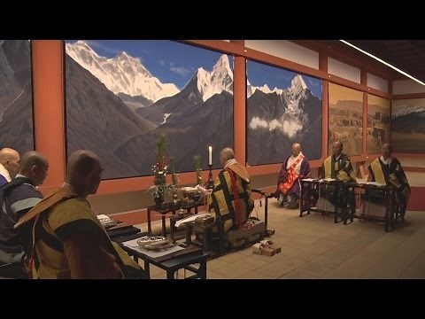 Praying for peace in front of artist Hirayama's mural at Yakushiji Temple in Nara