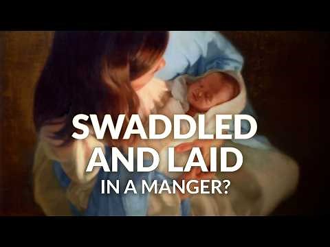 Why was Jesus swaddled and laid in a manger?