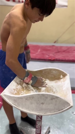 Gymnastics Routines by Young Male Athlete