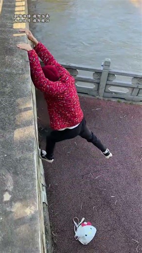 Grandma helps the little girl.