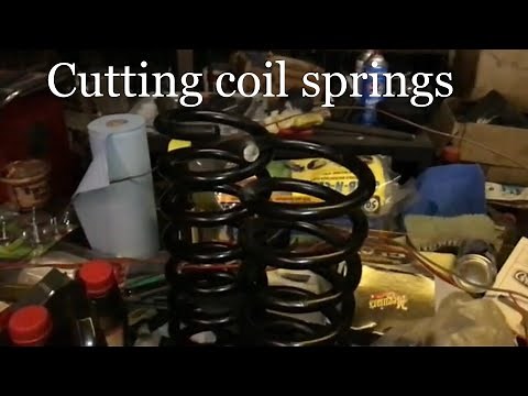 How to cut coil springs to lower a car.