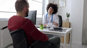 Female doctor and male patient talking in a medical consultation in a clinic. High quality 4k footage