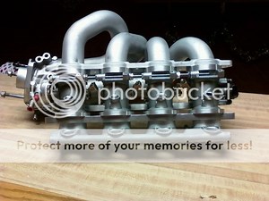 water injection before or after fuel injectors?