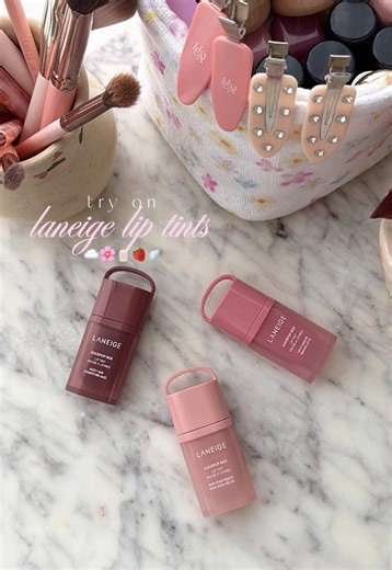 let’s try on the new laneige lip tints !! 🌸🍓 what i love- the colors, the stain!! what i dont- the smell (artificial & a bit strong), the packaging (a bit bulky for my taste) will you be trying these? #lipgloss #lipstain #makeup #makeuptutorial #lipcombo @laneige_us